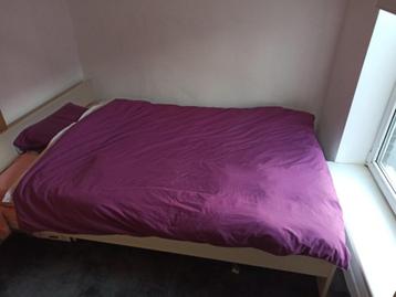 IKEA double bed with spring matress and slats