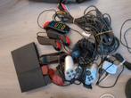 PS2 slim + 2 controllers + games + eyetoy + buzz controllers, Ophalen of Verzenden, Zo goed als nieuw