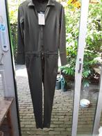 NIEUWE KAKHI KLEURIGE  TRAVEL JUMPSUIT VAN LADY DAY, Kleding | Dames, Jumpsuits, Ophalen of Verzenden, Nieuw, Maat 34 (XS) of kleiner