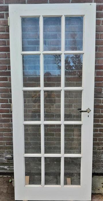 Hardhouten binnendeur met glas beschikbaar voor biedingen