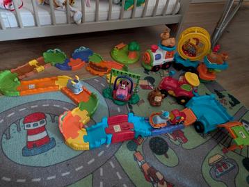 VTech toet toet auto trein en autobaan en tractor beschikbaar voor biedingen