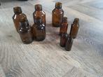 Diverse oude apothekersflesjes, Ophalen