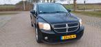 Dodge Caliber 2.0 CVT Luxury 2010 Zwart, Auto's, Dodge, Zwart, 157 pk, Zwart, Stoelverwarming