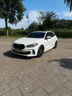 BMW 1-Serie 118i met BMW premium selection garantie!, Auto's, BMW, 65 €/maand, 15 km/l, Wit, Particulier