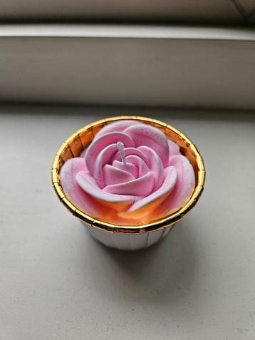 Roze roos kaars beschikbaar voor biedingen