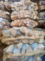 Droog haardhout in grote netzakken van 50 liter, Tuin en Terras, Haardhout, Minder dan 3 m³, Ophalen of Verzenden, Overige houtsoorten