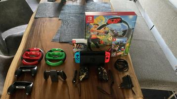Nintendo switch 1 met veel toebehoren beschikbaar voor biedingen