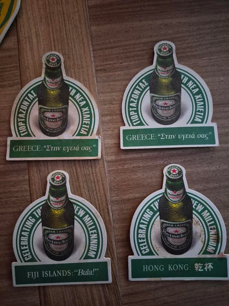 Set van 4 Heineken viltjes - Millennium editie, Ophalen of Verzenden