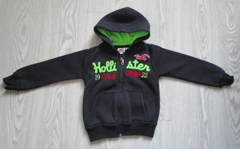 Hollister Kinder Hoodie Vest Zwart Groen Logo Maat 98/104, Jongen of Meisje, Trui of Vest, Ophalen of Verzenden, Zo goed als nieuw