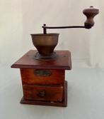 antieke koffiemolen, Ophalen