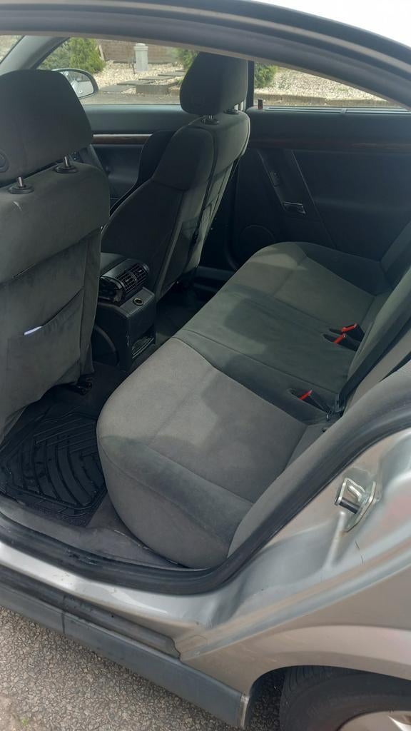 Opel Vectra benzine en gas.  1.8. 16V SDN 2004 Grijs, Voorwielaandrijving, 1328 kg, Stof, Zwart