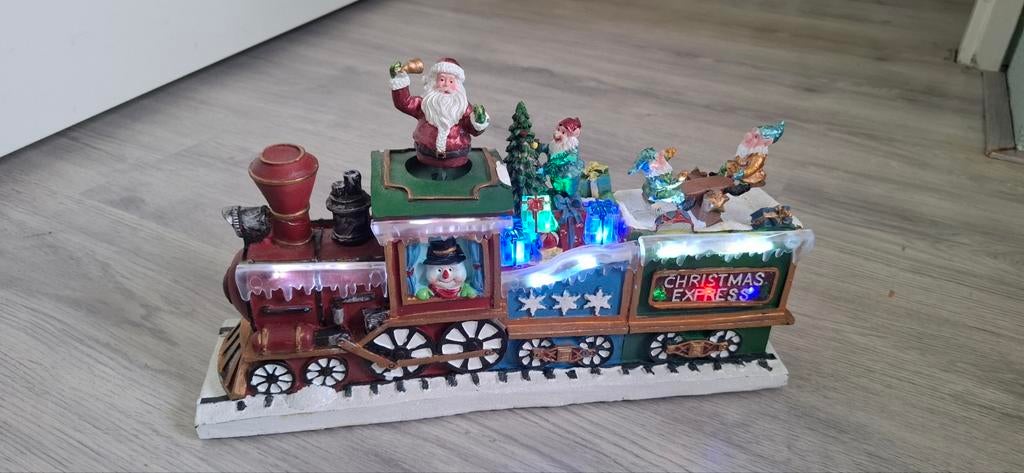 Kerstmis trein met bewegin en licht, Ophalen