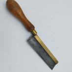 Fijn en klein kapzaagje (ML)