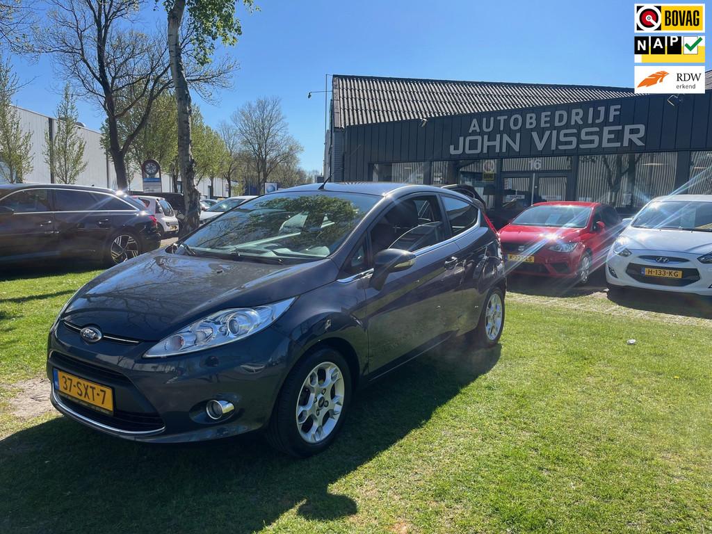 Ford Fiesta 1.25 Titanium * stijlvolle & zuinige hatchback *, Voorwielaandrijving, Euro 5, Stof, 4 cilinders