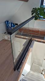 Stalen balustrade met glazen panelen, Ophalen