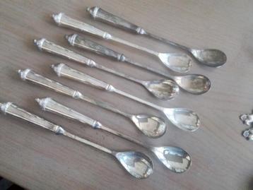 8 zware en verzilverde dessertlepels  beschikbaar voor biedingen