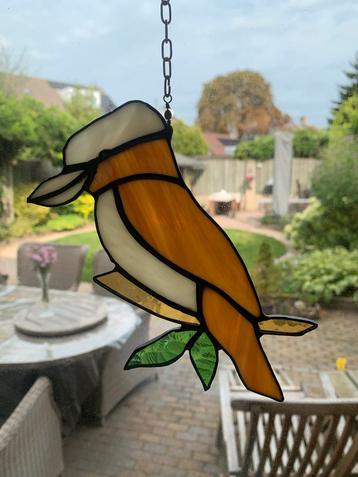 Glas in lood vogel beschikbaar voor biedingen