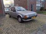 Ford Escort 1.1 Laser 1986 Apk 16-01-2028, Auto's, Oldtimers, Voorwielaandrijving, Stof, Bruin, Origineel Nederlands
