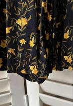 Zwart met geel gebloemd rokje met binnenbroekje, Maat 38/40 (M), Ophalen of Verzenden, Zo goed als nieuw, Boven de knie