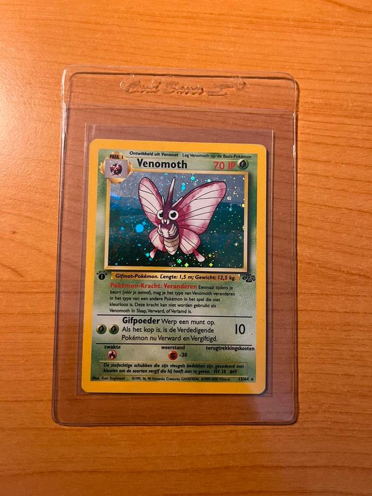 Venomoth Holo 1st edition NL - Jungle #13/64, Hobby en Vrije tijd, Verzamelkaartspellen | Pokémon, Gebruikt, Ophalen of Verzenden