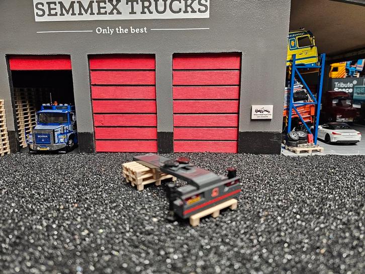 Wsi achterbumper met stempelpoten en schuifschotel. B keus, Hobby en Vrije tijd, Modelauto's | 1:50, Zo goed als nieuw, Bus of Vrachtwagen