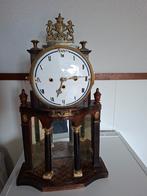 Antieke pendule met spiegel, Ophalen