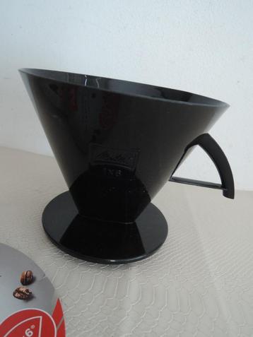 Zwart Melitta koffiefilter beschikbaar voor biedingen