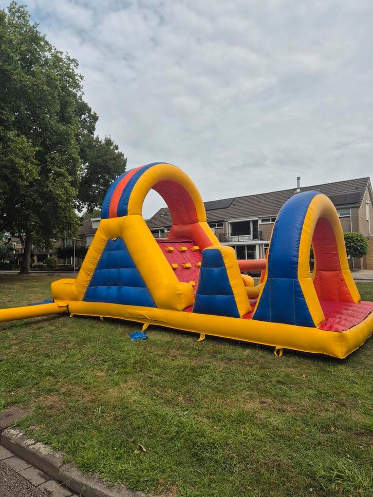 Stormbaan met glijbaan te huur, Hobby en Vrije tijd, Feestartikelen | Verhuur, Overige, Ophalen of Verzenden