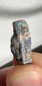 Stukje Australisch opaal, Ophalen