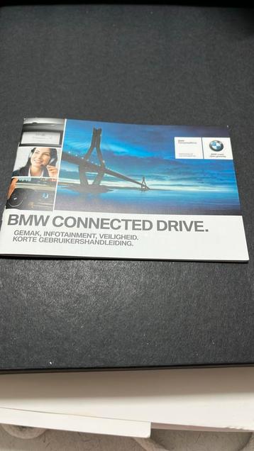 Bmw folders in een zwarte harde doos beschikbaar voor biedingen