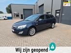 Opel Astra Sports Tourer 1.4 Turbo Cosmo TOP OCCASION, Auto's, Voorwielaandrijving, Gebruikt, 4 cilinders, Blauw