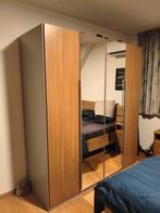 Grote kledingkast met spiegeldeuren, Ophalen