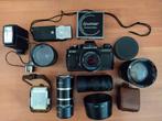 Oude goedwerkende praktica fotocamera met lenzen, Verzenden