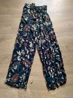 Donkerblauwe broek met split en junglemotief, Kleding | Dames, Broeken en Pantalons, Lang, Maat 34 (XS) of kleiner, Blauw, Ophalen of Verzenden