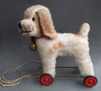 Jaren 50 Hond Hondje op Wielen met rinkelbel om de hals