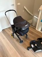 Doona + isofix zonnenscherm, boodschappentas, regenhoes, Ophalen of Verzenden, Zo goed als nieuw, Overige merken, Regenhoes