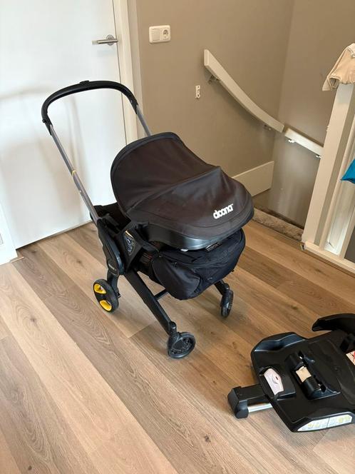 Doona + isofix zonnenscherm, boodschappentas, regenhoes, Kinderen en Baby's, Buggy's, Zo goed als nieuw, Overige merken, Regenhoes