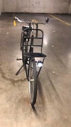 Te koop een zwarte transport Delta fiets 28 inch, Fietsen en Brommers, Versnellingen, Zo goed als nieuw, 57 tot 61 cm, Ophalen