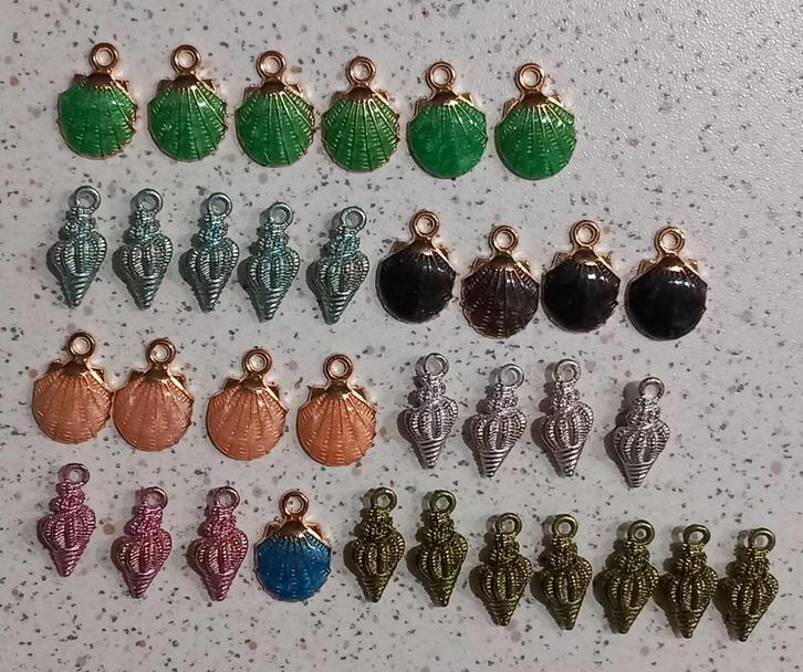 Metalen schelpen en zeesterren bedels "nieuw", Hobby en Vrije tijd, Kralen en Sieraden maken, Nieuw, Bedel, Ophalen of Verzenden