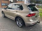 Volkswagen Tiguan 1.4 TSI DSG I R LINE I Trekhaak I COCPIT I, Auto's, Volkswagen, Zwart, 4 cilinders, 150 pk, Beige