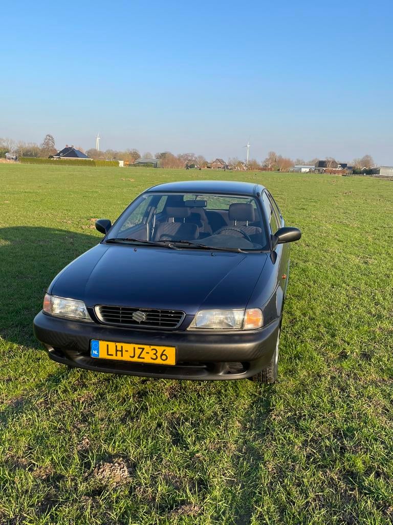 Suzuki Baleno 1.6 GL 1995 Blauw, Auto's, Voorwielaandrijving, 880 kg, 4 cilinders, Origineel Nederlands