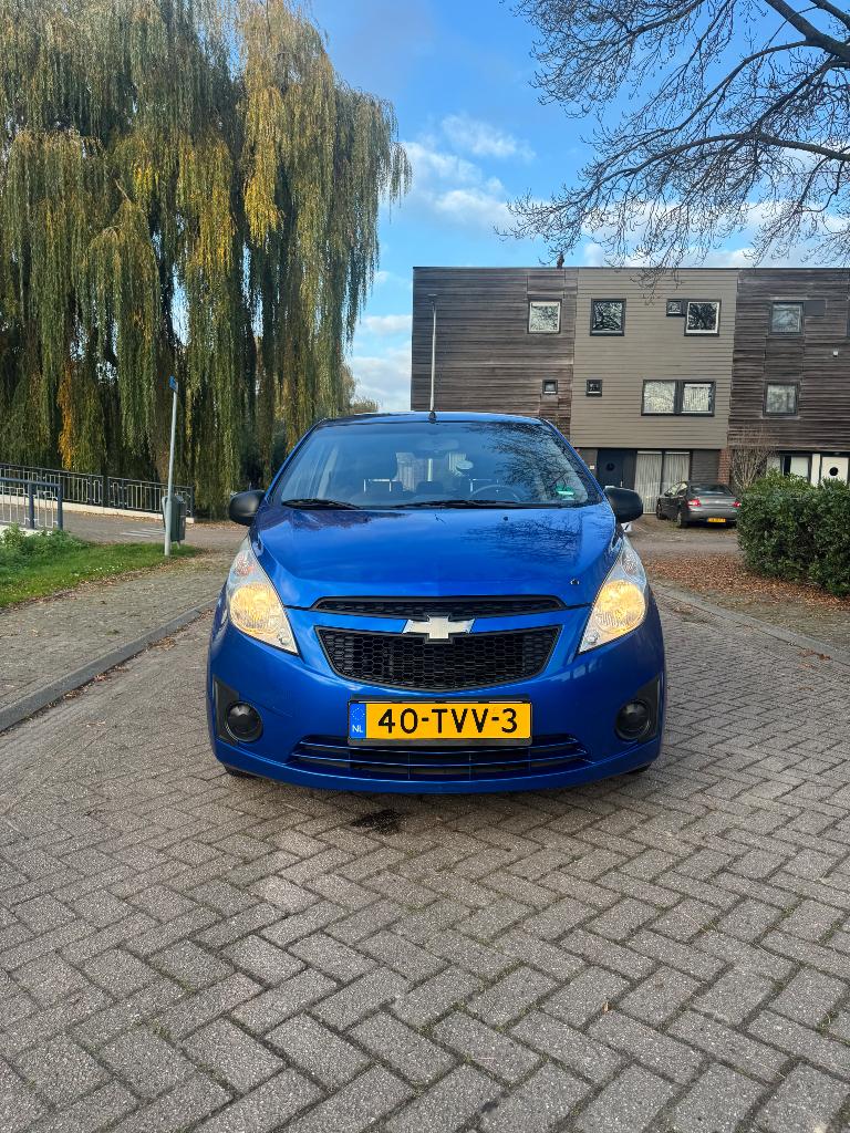 Chevrolet Spark 1.0 Bifuel 2012 Blauw, Auto's, 15 km/l, 37 €/maand, 4 cilinders, Blauw
