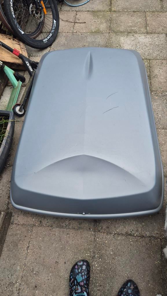 grijze dakkoffer van harpo, Ophalen