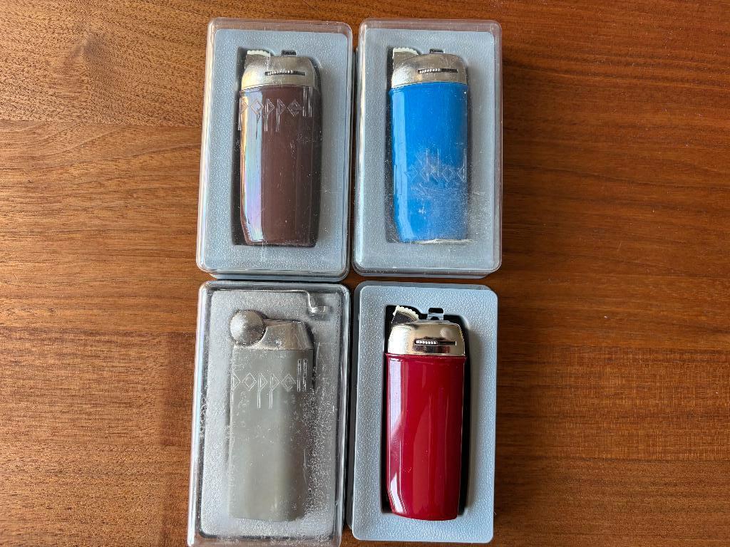 3 nieuwe en 1 gebruikte Poppell aanstekers, Ophalen of Verzenden, Zo goed als nieuw, Aansteker
