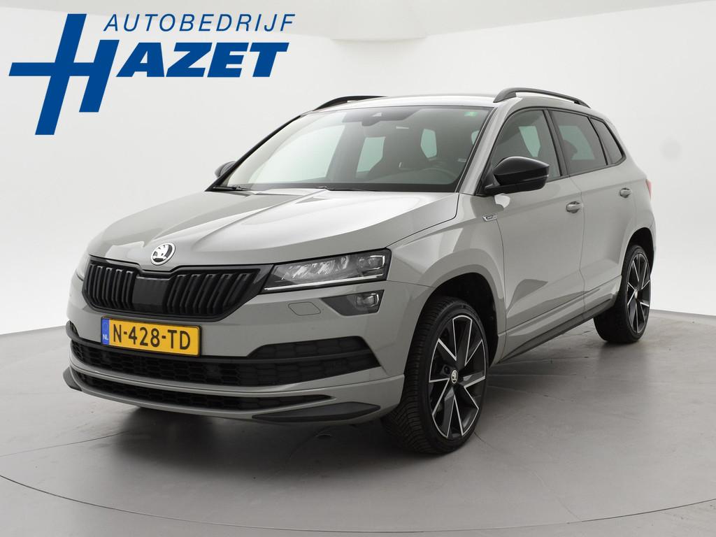 Skoda Karoq 1.5 TSI ACT 150 PK DSG SPORTLINE + CANTON AUDIO, Stof, 4 cilinders, 19 km/l, Adaptive Cruise Control