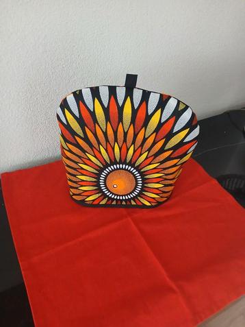 Theemuts met Afrikaans Design omkeerbaar. beschikbaar voor biedingen