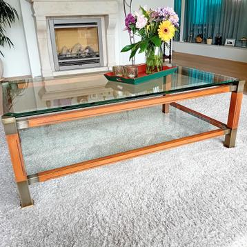 Glazen salontafel met geslepen glas. zgan houten omranding 