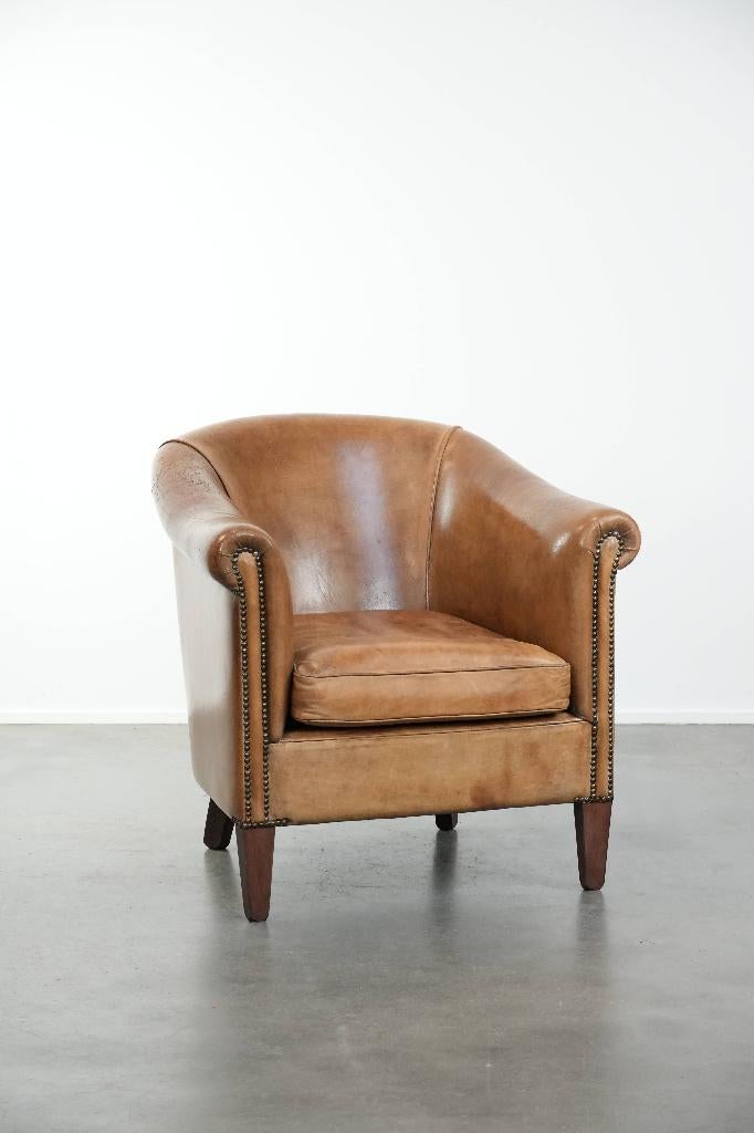 Schapenleren clubfauteuil met lichte cognac kleuren, Ophalen, Gebruikt, ., Vintage