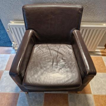 Gratis donker bruine fauteuil 