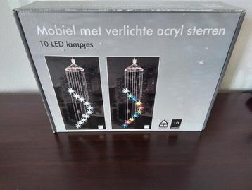 Kerstverlichting - mobiel met sterren beschikbaar voor biedingen